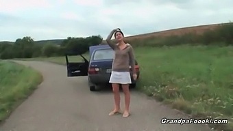 Young Girl Entices Older Man On The Highway