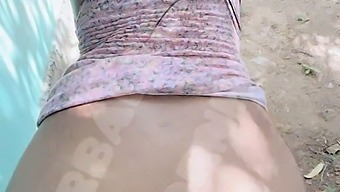 Amateur Couple Engages In Outdoor Oral Sex On The Street